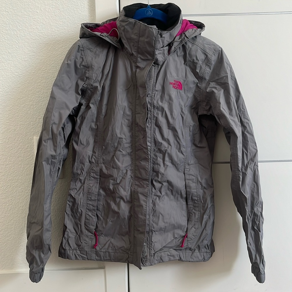 Pink and grey North Face jacket.